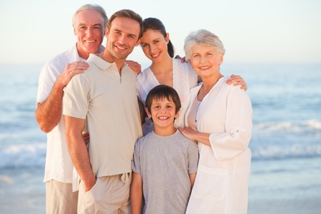 Portrait of a smiling family at the beach