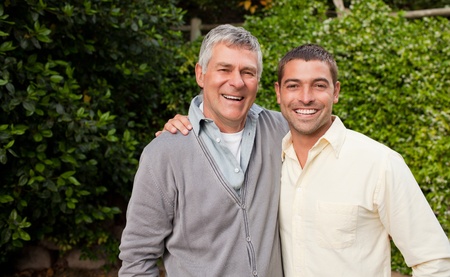 Smiling woman sitting on her sofaの写真素材