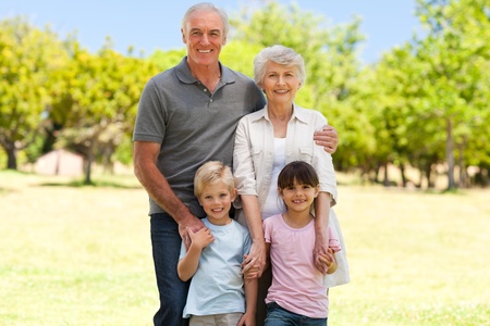 Grandparents with their grandchildren in the park