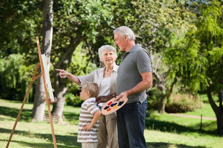 Family painting in the gardenの写真素材