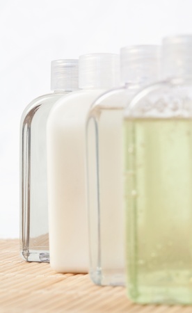 Close up of four massage oil bottlesの写真素材