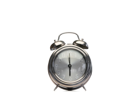Alarm clock on a white backgroundの写真素材