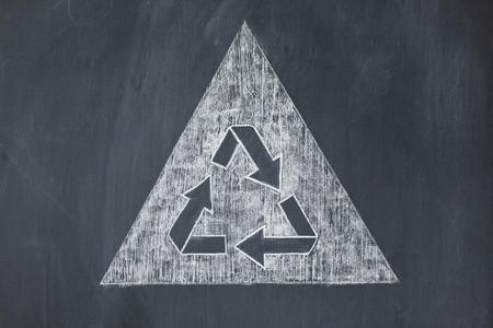 Recycle symbol on a white background on a blackboardの写真素材