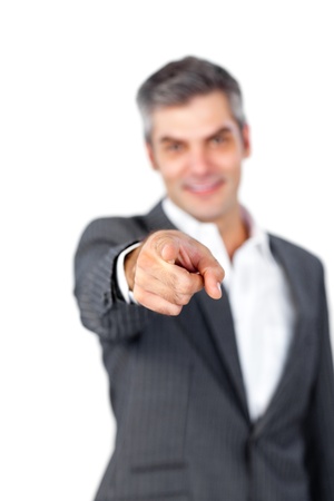 Confident mature businessman showing OK sign の写真素材