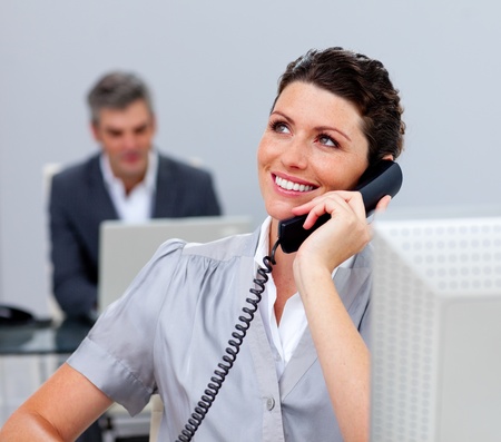 Attractive business woman on phoneの写真素材