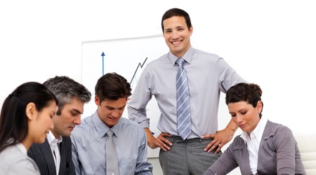 Charming assertive businessman giving a presentation の写真素材