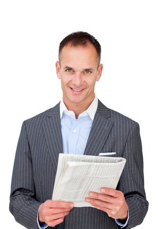 Mature businessman reading a newspaper の写真素材