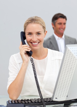 Beautiful businesswoman talking on phoneの写真素材