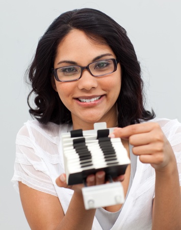 Ethnic businesswoman searching for an indexの写真素材
