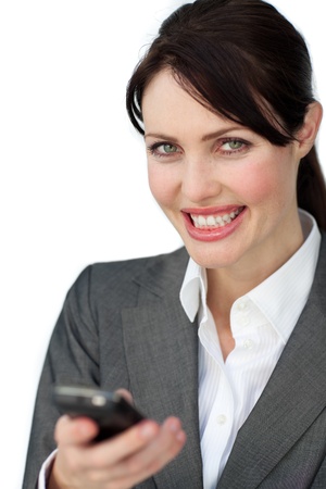 Positive businesswoman using a mobile phoneの写真素材