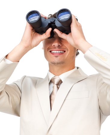 Visionary businessman looking through binoculars の写真素材