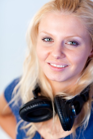 Beautiful woman with headphones on の写真素材