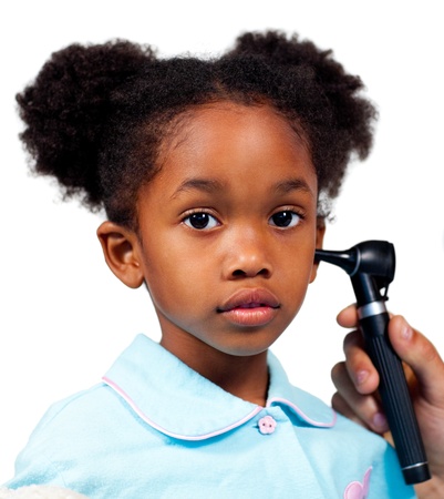 Afro-american little girl attending medical check-up の写真素材