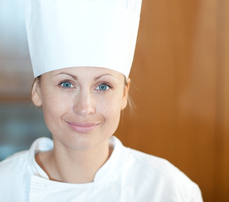 Portrait of a beautiful female chef の写真素材