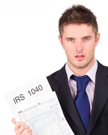 Man holding out his irs returns formの写真素材