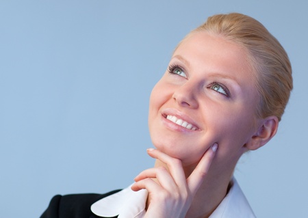 Happy Businesswoman looking upwardsの写真素材