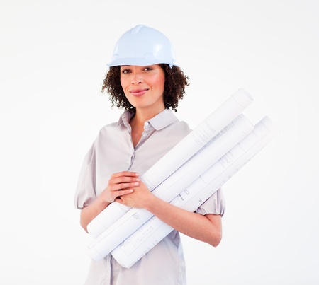 Architect woman with hard-hat holding blueprintsの写真素材