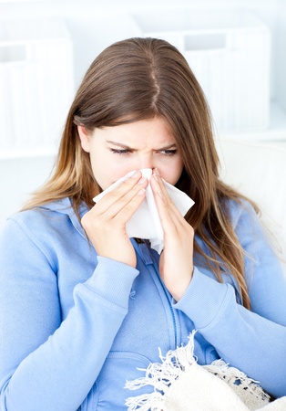 Sick woman sitting at home in her bed Sick woman sitting at home in her bed