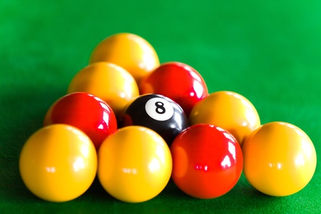 Close-up of billiard balls dispsed in triangle