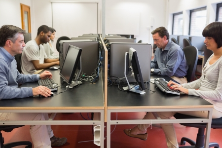 People working at computers in college