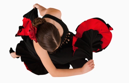Overhead view of turning dancer against a white backgroundの写真素材