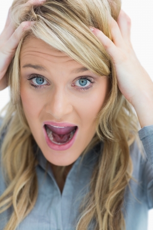 Woman looking frustrated and screamingの写真素材