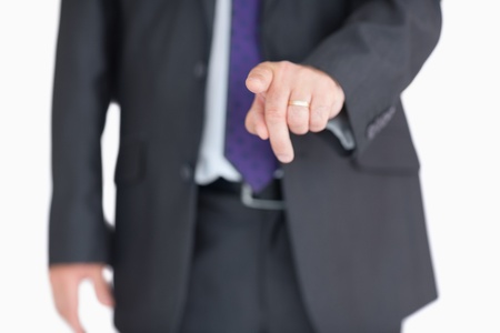 Businessman pointing at something to the frontの写真素材