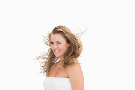 Smiling blonde windswept girl