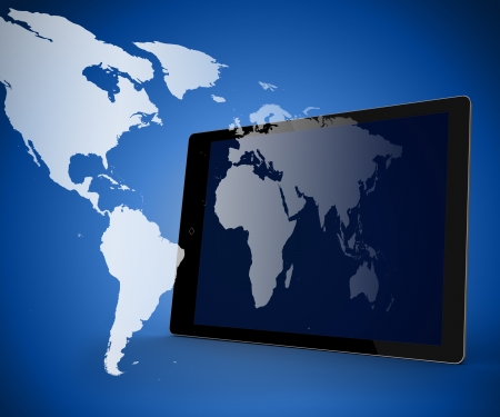 Tablet computer standing against dark blue background with worldの写真素材