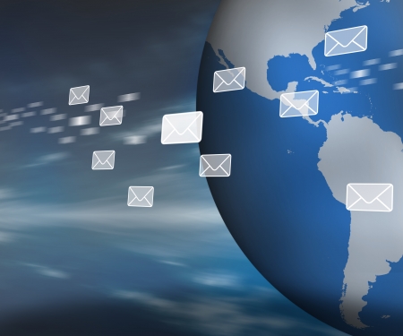Messages floating past globe on dark blue backgroundの写真素材