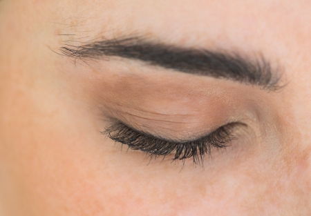 Close up of woman having eyes shutの写真素材