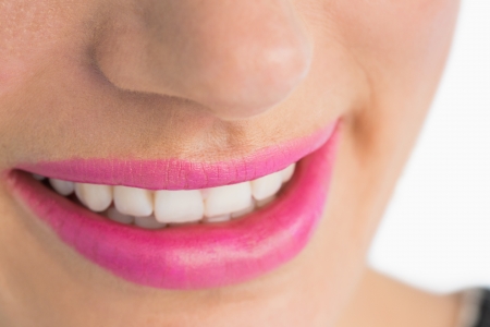 Close up of white smile and pink lipsの写真素材