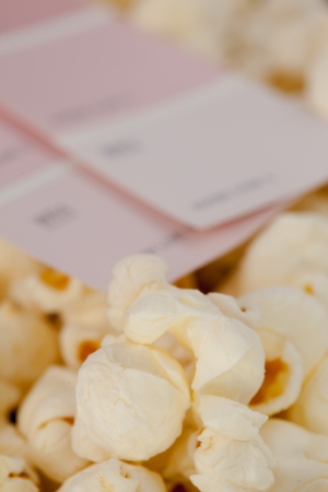 Pop corn and blurred cinema ticketsの写真素材