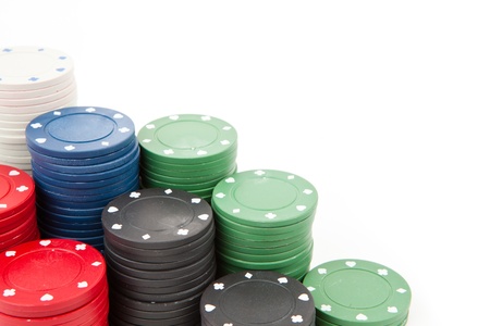 Coins of poker against a white background