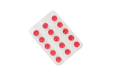 Close up of pills against white background