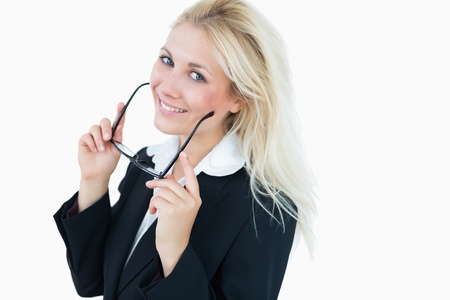 Portrait of attractive young business woman with glasses over white backgroundの写真素材