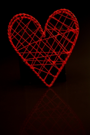 Love heart shaped box on black backgroundの写真素材