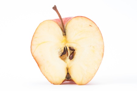 Half an apple on white backgroundの写真素材