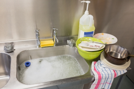 Dirty dishes in the kitchenの写真素材