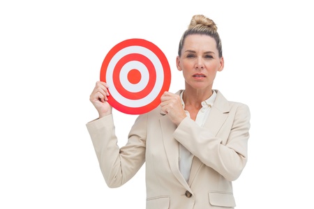 Businesswoman holding target in front of the cameraの写真素材
