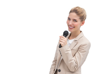 A well dressed woman with microphone on her handの写真素材