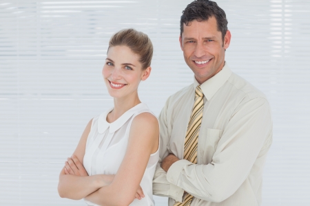Business people smiling in officeの写真素材