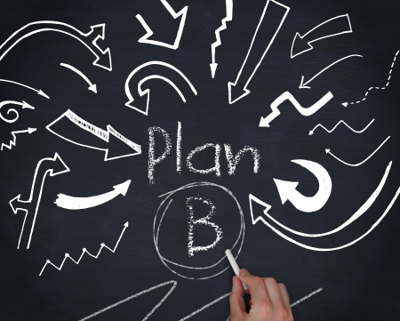 Hand writing plan B on black backgroundの写真素材