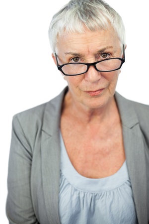 Mature woman wearing glasses on white backgroundの写真素材