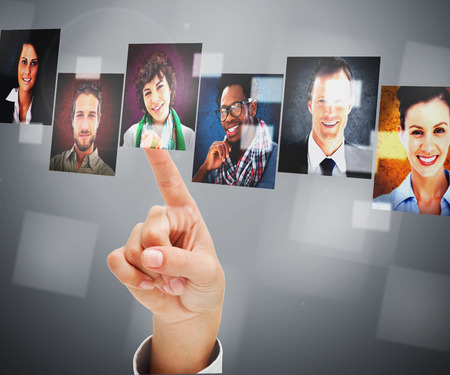 Female finger pointing at digital interface showing profile pictureの写真素材