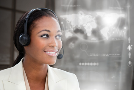 Portrait of an Afro-american businesswoman with headset in the office