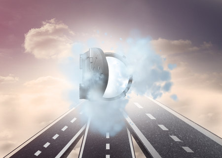 Open safe in dust cloud over streets in skyの写真素材