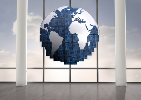 Digitally generated blue globe floating in roomの写真素材