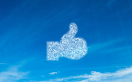 White thumb up icon in sky