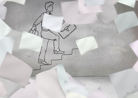 Papers in front of grey wall with comic manの写真素材